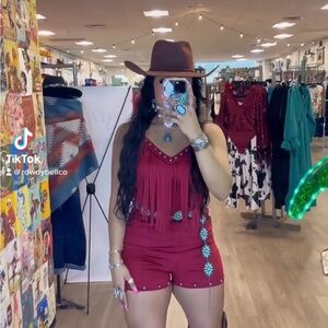 Red velvet romper with fringe